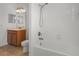 Bathroom with single sink, tub/shower combo and tile flooring at 1394 Palmetto Dunes St, Champions Gate, FL 33896