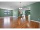 Open living area with laminate wood flooring and plenty of natural light at 1394 Palmetto Dunes St, Champions Gate, FL 33896