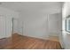 Spacious main bedroom showcases wood-look floors and a bathroom with shower/tub combo at 1394 Palmetto Dunes St, Champions Gate, FL 33896