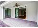 Spacious patio featuring brick pavers and views into the home at 1394 Palmetto Dunes St, Champions Gate, FL 33896