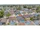 A neighborhood aerial view showcases this home with a screened-in pool, nicely situated within the community at 142 Ethan Ave, Davenport, FL 33897