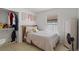 Bedroom featuring tiled floors and ample closet space at 142 Ethan Ave, Davenport, FL 33897