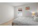 Neutral bedroom with a view to the exterior at 142 Ethan Ave, Davenport, FL 33897