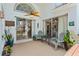 Outdoor patio with ceiling fan and view of pool and backyard through sliding glass doors at 142 Ethan Ave, Davenport, FL 33897