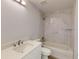 Clean bathroom with a tub, shower, and marble tile at 14512 Sw 25Th Lane, Ocala, FL 34481