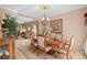 Formal dining room with elegant chandelier, furniture, and décor at 15037 Cedar Branch Way, Orlando, FL 32824