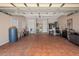 Spacious garage with tile flooring and plenty of storage at 15037 Cedar Branch Way, Orlando, FL 32824