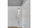 Bright entrance features a stained-glass window and ample closet space at 1651 Windsor Oak Ct, Kissimmee, FL 34744
