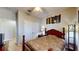 Cozy bedroom with a comfortable bed and a serene atmosphere at 1723 Brassie Ct, Kissimmee, FL 34746
