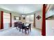 Elegant dining room with natural light, chandelier, and a modern table set at 1723 Brassie Ct, Kissimmee, FL 34746
