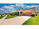 Inviting single-Gathering house with a screened porch and a well-kept front yard at 1723 Brassie Ct, Kissimmee, FL 34746