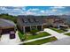 Beautiful home featuring a well-manicured front lawn and an attached two-car garage at 1723 Brassie Ct, Kissimmee, FL 34746