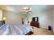 This main bedroom has an ensuite bath, a ceiling fan and is spacious at 1723 Brassie Ct, Kissimmee, FL 34746