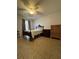 Bedroom with tile floors, ceiling fan, and a window, offering a comfortable living space at 1844 Townhall Ln # 1844, Orlando, FL 32807