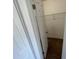 Walk-in closet featuring wire shelving and neutral carpeting at 198 N Lake Ct, Kissimmee, FL 34743