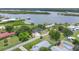 Breathtaking aerial shot highlighting the property's proximity to the waterfront and surrounding lush landscapes at 203 Parkwood Ln, Edgewater, FL 32132