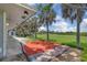 Expansive backyard featuring a spacious green lawn, mature trees, and potential for outdoor activities and relaxation at 203 Parkwood Ln, Edgewater, FL 32132