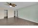 Spacious bedroom featuring a ceiling fan, and a neutral color scheme at 203 Parkwood Ln, Edgewater, FL 32132