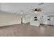 Open-concept space featuring modern hardwood floors and an island kitchen, perfect for entertaining guests at 203 Parkwood Ln, Edgewater, FL 32132