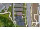 Aerial view of a house with a red border, showcasing its location relative to neighboring homes and a nearby road at 2057 Celebration Blvd, Kissimmee, FL 34747