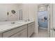 bathroom featuring double sinks with white countertops and a decorative shower curtain at 2057 Celebration Blvd, Kissimmee, FL 34747