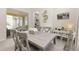 Well-lit dining area with sliding glass doors and views of the outdoors at 2057 Celebration Blvd, Kissimmee, FL 34747