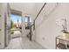 Bright foyer with open staircase, white tile flooring, and lots of natural light at 2057 Celebration Blvd, Kissimmee, FL 34747