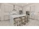 Modern kitchen with a large island and seating at 2057 Celebration Blvd, Kissimmee, FL 34747