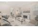 Inviting living room with fireplace and bright lighting at 2057 Celebration Blvd, Kissimmee, FL 34747