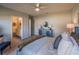 Serene bedroom with en-suite bathroom featuring a plush bed and stylish decor at 246 Cheshire Ct, Kissimmee, FL 34758
