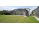The screened-in pool and patio area offer a secluded outdoor living space at 257 Lancaster Dr, Davenport, FL 33897