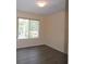 Bright bedroom with a large window offering plenty of natural light at 257 Lancaster Dr, Davenport, FL 33897