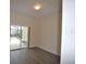 Bedroom with sliding door access to outdoor patio and pool views at 257 Lancaster Dr, Davenport, FL 33897