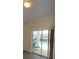 Room view with sliding glass doors providing access to the pool area at 257 Lancaster Dr, Davenport, FL 33897