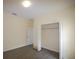 This bedroom features a closet and neutral paint, perfect for personalization at 257 Lancaster Dr, Davenport, FL 33897