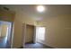 Cozy bedroom featuring a standard closet and a bright window at 257 Lancaster Dr, Davenport, FL 33897
