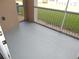 Balcony with gray flooring and metal railing offers outdoor enjoyment at 3001 Greystone Loop # 106, Kissimmee, FL 34741
