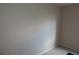 Neutral bedroom featuring a wall with carpet flooring and base trim at 3001 Greystone Loop # 106, Kissimmee, FL 34741