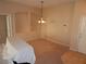 Dining room with a chandelier and neutral walls at 3001 Greystone Loop # 106, Kissimmee, FL 34741