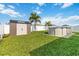 Well-maintained backyard with above-ground pool, storage shed and manicured lawn at 3211 Sweet Acres Pl, St Cloud, FL 34772