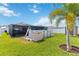 Spacious backyard showcasing an above-ground pool, storage shed and lush green lawn at 3211 Sweet Acres Pl, St Cloud, FL 34772