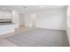 Spacious living room area with lots of natural light and view to the kitchen at 3214 Viceroy Ct, Kissimmee, FL 34759