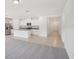 Open-concept living room and kitchen area with tile flooring at 3214 Viceroy Ct, Kissimmee, FL 34759