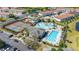 Aerial view of resort-style community with pool, tennis courts, and playground at 3391 Cortland Dr, Davenport, FL 33837