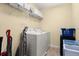 Well-equipped laundry room with modern washer and dryer at 3391 Cortland Dr, Davenport, FL 33837