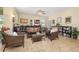 Inviting living room featuring tile flooring, neutral paint, and lots of natural light at 3391 Cortland Dr, Davenport, FL 33837