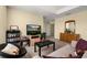 Bright living room with neutral walls, carpeted floors, and cozy decor for relaxation at 3391 Cortland Dr, Davenport, FL 33837