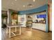 Interior view of cafe area with market sign, display cases, and modern design at 341 Lasso Dr, Kissimmee, FL 34747