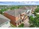 View of the home features a beautiful stone and siding facade, an attached two car garage, and professionally landscaped yard at 341 Lasso Dr, Kissimmee, FL 34747