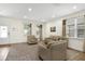 Bright living room with neutral-toned furniture and large windows for natural light at 341 Lasso Dr, Kissimmee, FL 34747